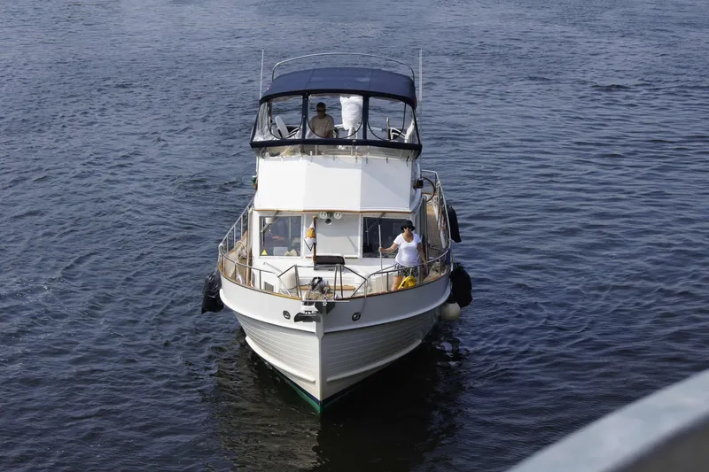 Slide: The Image of 1993 Grand Banks 42 Classic yacht cruising on open water. - 134