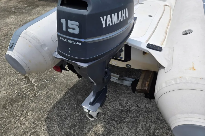Slide: The Image of Yamaha 15 horsepower four-stroke outboard motor on inflatable boat, Grand Banks 42 Classic, 1993. - 136