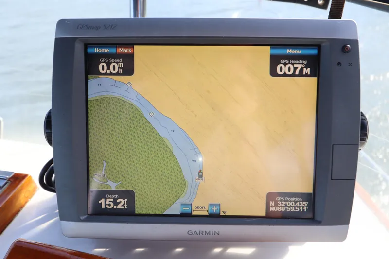 Slide: The Image of Garmin GPS display on 1993 Grand Banks 46 Classic, showing speed, heading, and depth. - 29