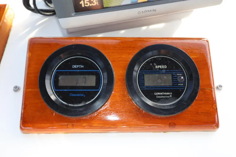 Slide: The Image of Depth and speed gauges on a 1993 Grand Banks 46 Classic yacht dashboard. - 30