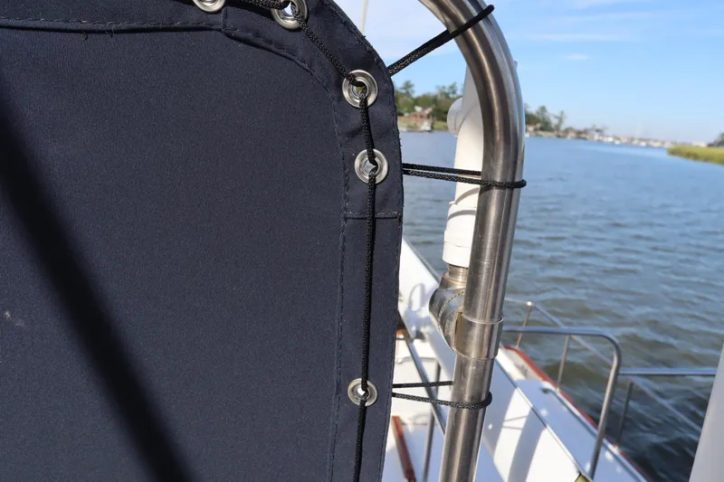 Slide: The Image of Close-up of 1993 Grand Banks 46 Classic boat railing and canvas detail. - 37