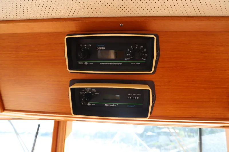 Slide: The Image of Navigation instruments on a 1993 Grand Banks 46 Classic yacht dashboard. - 50