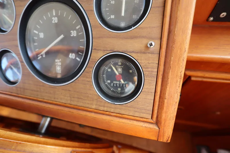 Slide: The Image of Close-up of 1993 Grand Banks 46 Classic boat dashboard gauges. - 53