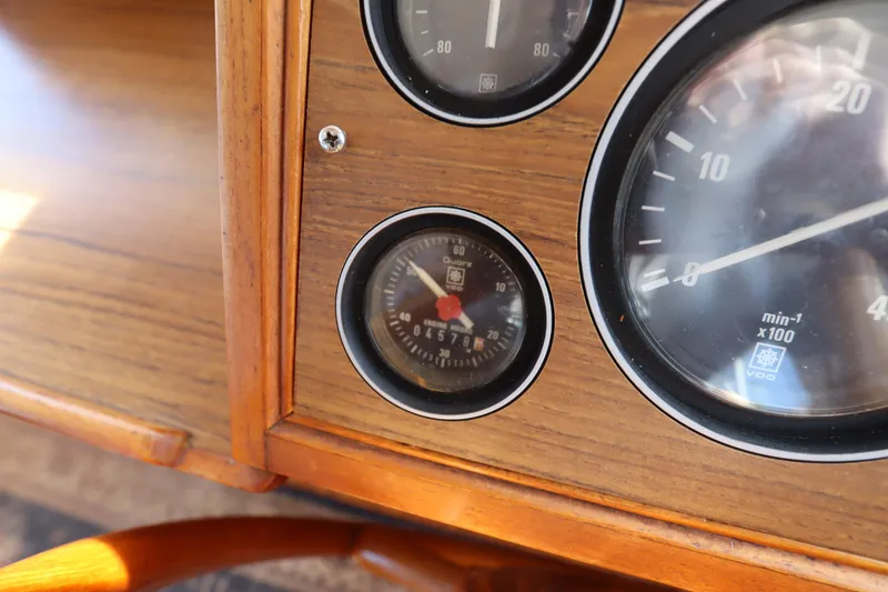 Slide: The Image of Close-up of 1993 Grand Banks 46 Classic boat dashboard gauges. - 54