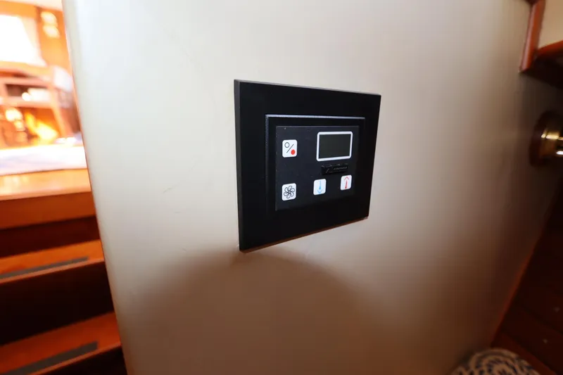 Slide: The Image of Control panel inside 1993 Grand Banks 46 Classic yacht, featuring digital display and buttons. - 68