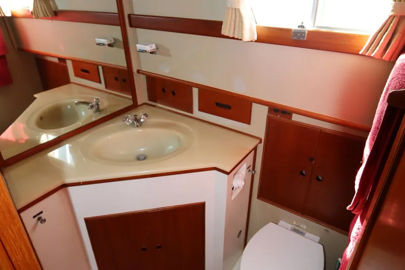 Slide: The Image of Bathroom interior of 1993 Grand Banks 46 Classic yacht with sink and toilet. - 81