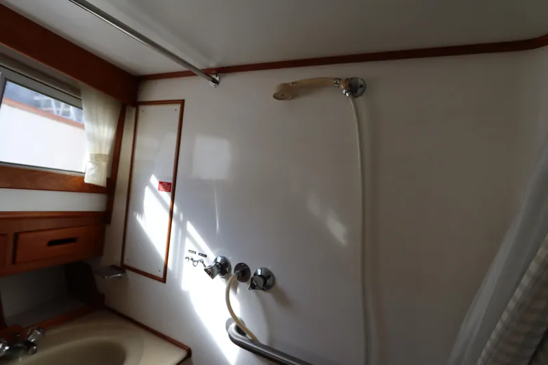 Slide: The Image of Bathroom interior of 1993 Grand Banks 46 Classic yacht with shower and sink. - 83