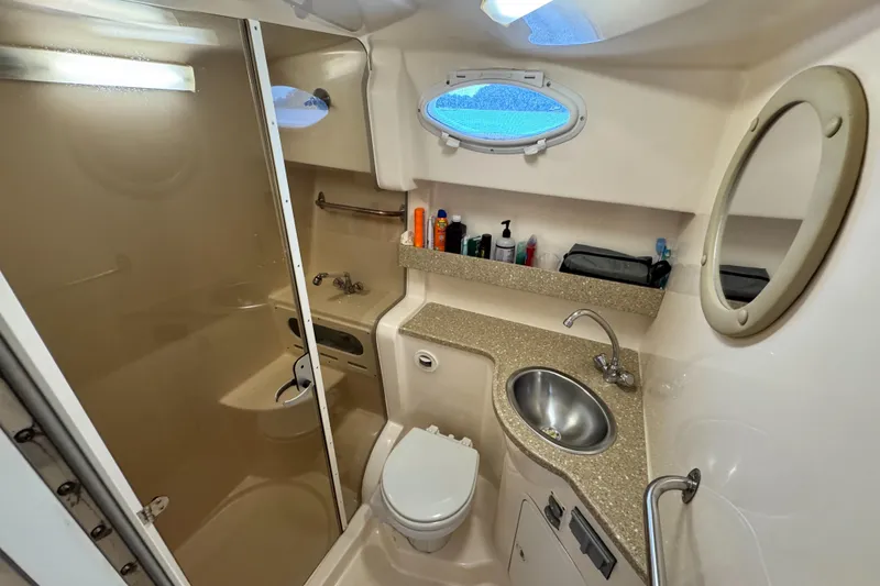 Slide: The Image of 2005 Rinker Fiesta Vee 342 bathroom with shower, sink, and toilet. - 30
