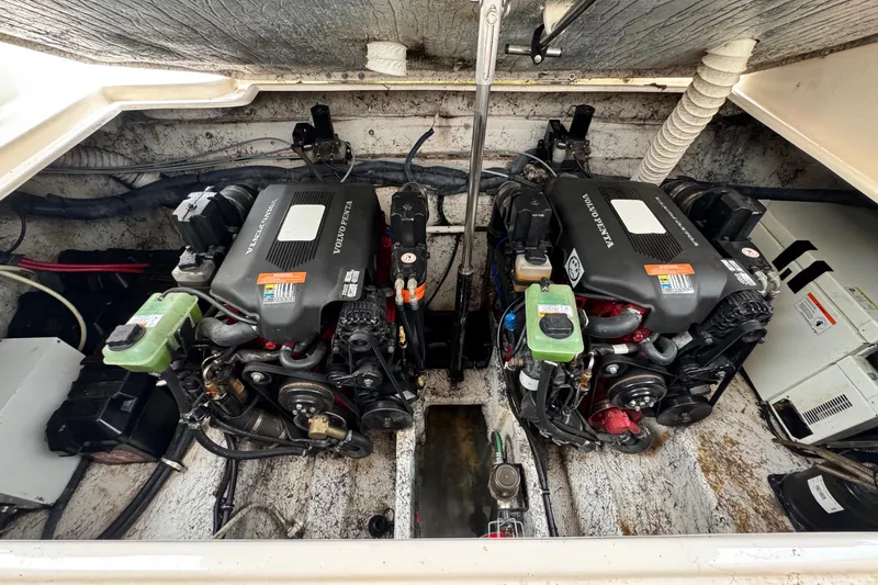 Slide: The Image of 2005 Rinker Fiesta Vee 342 engine compartment with dual Volvo Penta engines. - 33