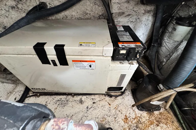 Slide: The Image of Kohler power system in 2005 Rinker Fiesta Vee 342 boat engine room. - 34