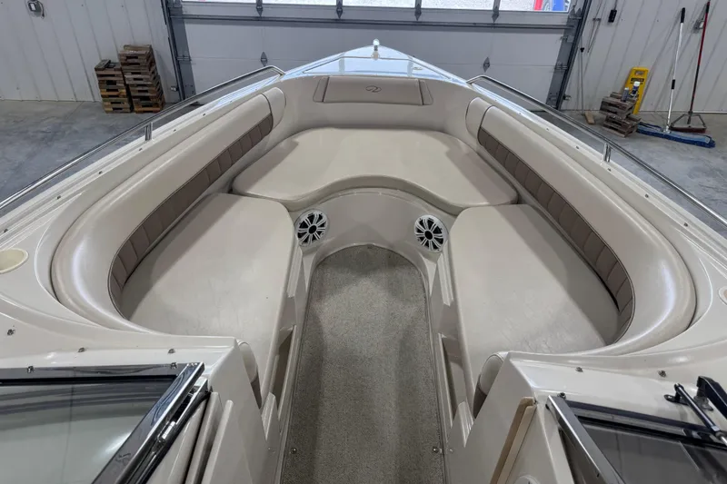 Slide: The Image of 1998 Regal 2800 LSR boat interior with spacious seating and modern design. - 8