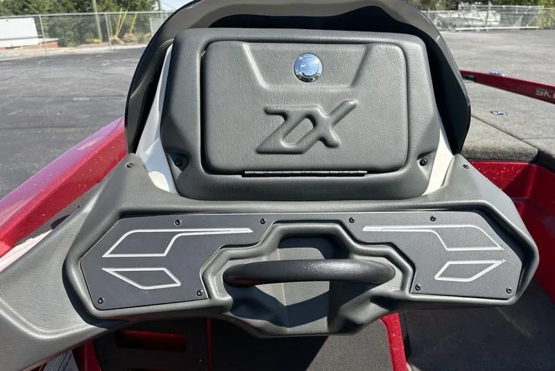 Slide: The Image of 2015 Skeeter ZX225 boat dashboard with sleek design and modern controls. - 15