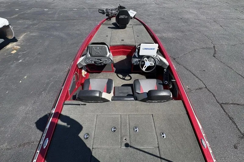 Slide: The Image of 2015 Skeeter ZX225 fishing boat interior with steering console and seating. - 28