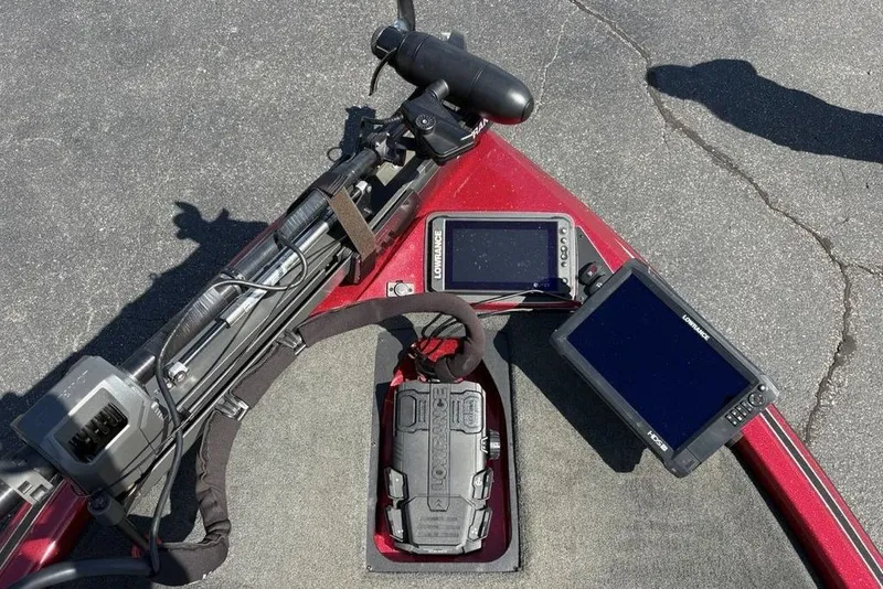 Slide: The Image of 2015 Skeeter ZX225 boat dashboard with electronic navigation and control systems. - 6