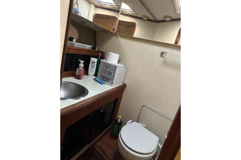 Slide: The Image of Bathroom interior of 1994 Bayliner 3888 Motoryacht with sink and toilet. - 20