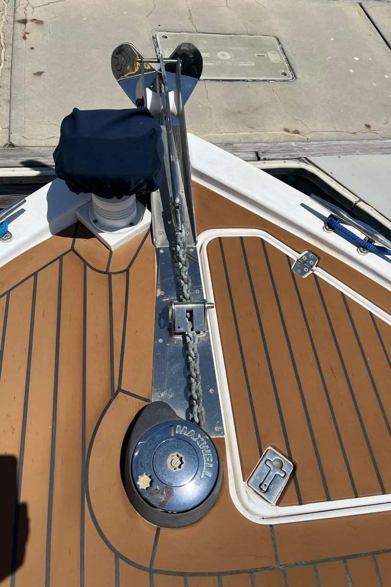 Slide: The Image of 2001 Legacy Yachts 28 Express deck with anchor and windlass system. - 23