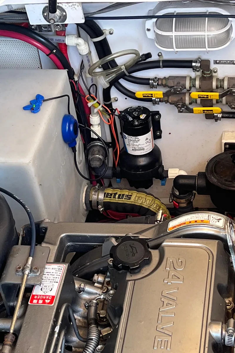 Slide: The Image of Scandvik faucet on 2001 Legacy Yachts 28 Express, featuring dual temperature controls. - 33
