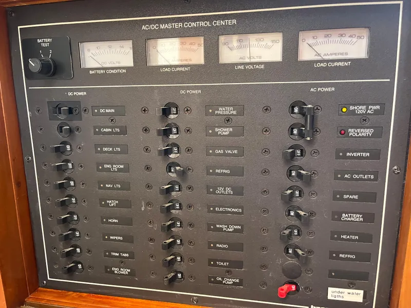 Slide: The Image of AC/DC master control panel on a 2001 Legacy Yachts 28 Express boat. - 7