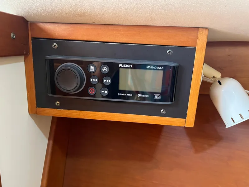 Slide: The Image of Audio system in 2001 Legacy Yachts 28 Express, featuring Fusion Bluetooth stereo. - 8