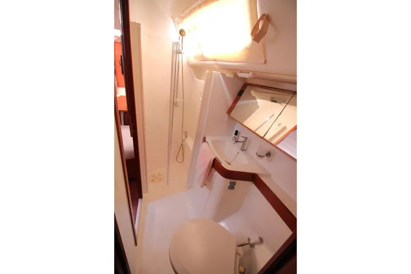 Slide: The Image of Bathroom interior of 2016 Beneteau Oceanis 40 yacht, featuring shower and sink. - 16