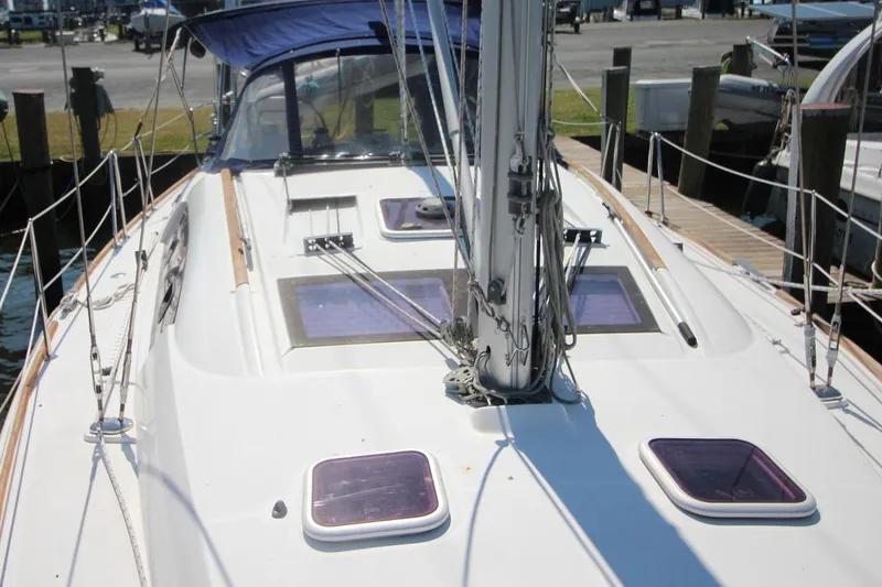 Slide: The Image of Beneteau Oceanis 40 sailboat deck, 2016 model, docked at marina. - 7