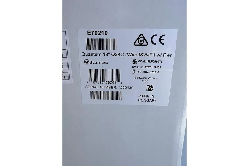 Slide: The Image of Label on a device showing model Quantum 18" Q24C, made in Hungary. - 5