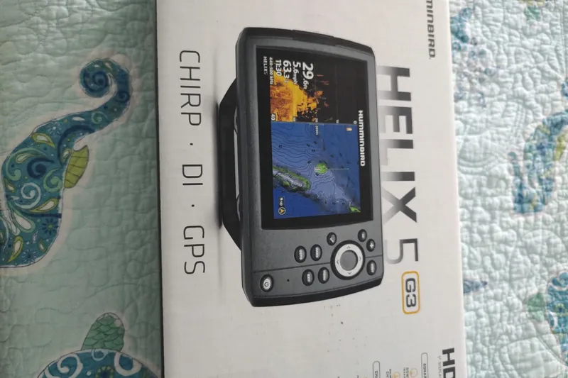 Slide: The Image of Humminbird Helix 5 G3 fish finder box with CHIRP, DI, GPS features. - 3
