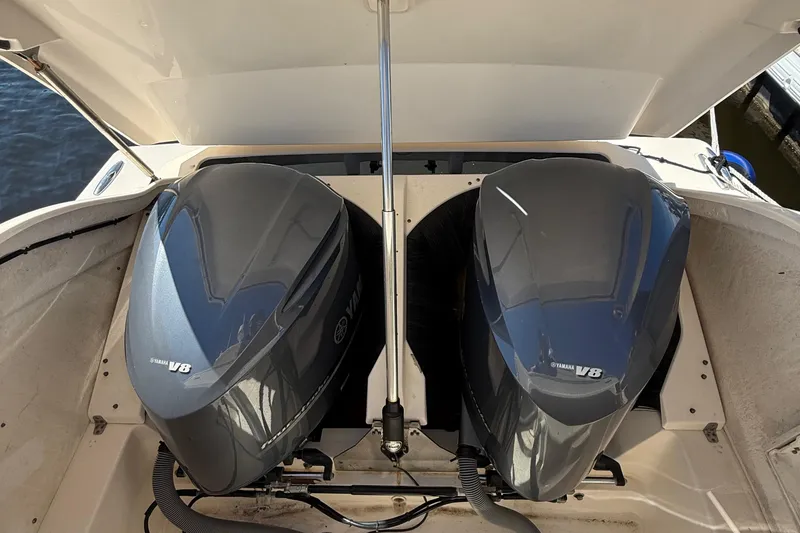 Slide: The Image of 2013 Pursuit SC 365i Sport Coupe with dual Yamaha V8 engines. - 19