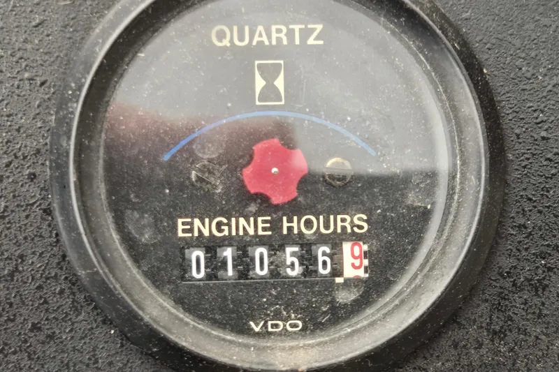 Slide: The Image of Engine hour meter showing 1,056.9 hours on 1992 Carver 36 Aft Cabin. - 26