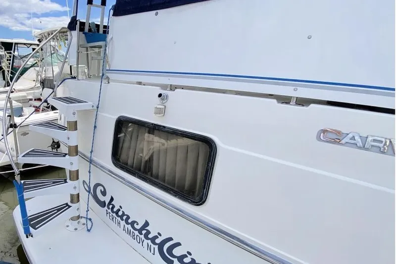 Slide: The Image of 1992 Carver 36 Aft Cabin boat with spiral staircase, docked in Perth Amboy, NJ. - 15