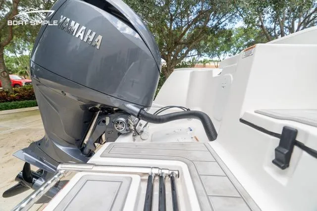 Slide: The Image of 2026 Sea Fox 228 Commander with Yamaha outboard engine, rear deck view. - 17