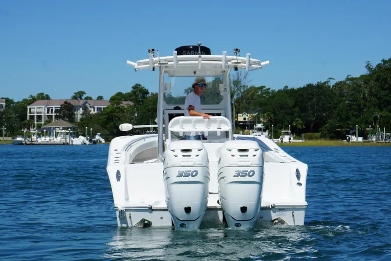 Slide: The Image of 2016 Onslow Bay 27 XS boat with dual 350 engines on the water. - 6