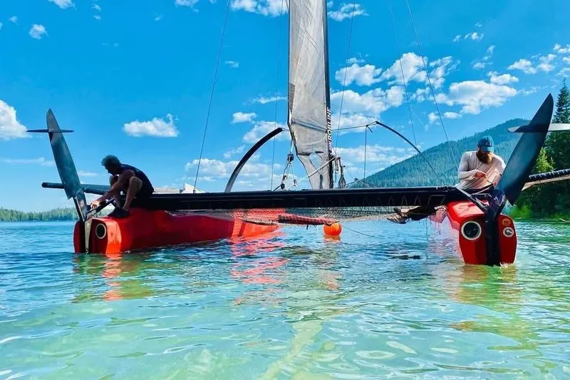 Slide: The Image of Sailing on a Marstrom MC 32 catamaran in clear waters, 2011 model. - 5