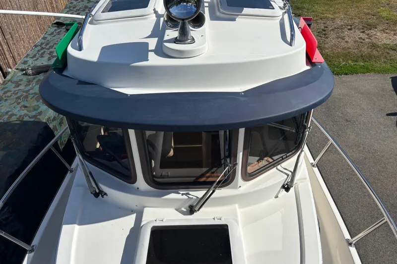 Slide: The Image of 2009 Ranger Tugs R-21 EC boat, top view of cabin and deck details. - 2
