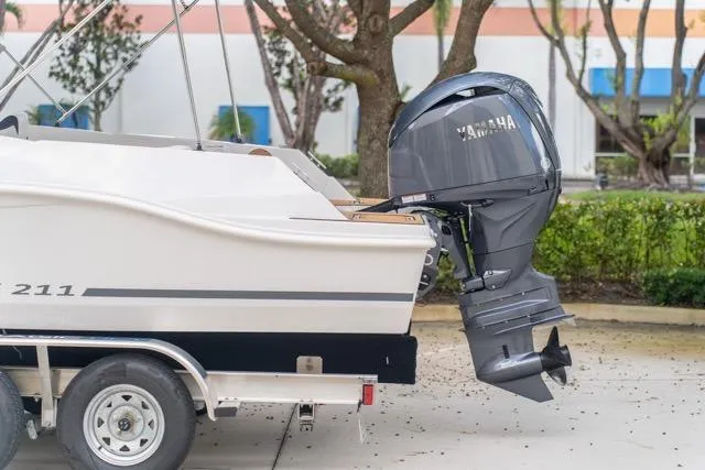 Slide: The Image of 2026 Starcraft SVX 211 OB boat with Yamaha outboard motor on trailer. - 3