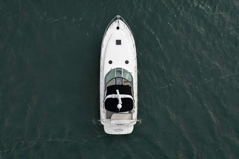 Slide: The Image of Aerial view of 2003 Sea Ray 360 Sundancer yacht on open water. - 14