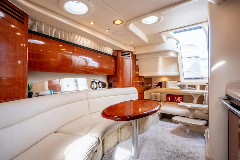 Slide: The Image of Luxurious interior of 2003 Sea Ray 360 Sundancer yacht with elegant wood finishes. - 23