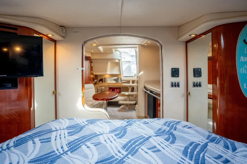 Slide: The Image of Luxurious interior of 2003 Sea Ray 360 Sundancer yacht with modern amenities and elegant design. - 27