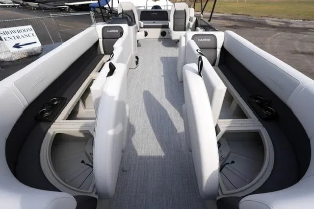 Slide: The Image of 2026 Harris Cruiser 250 pontoon boat interior with spacious seating and modern design. - 11