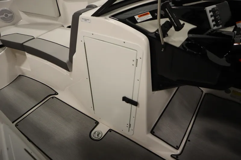 Slide: The Image of 2026 Yamaha Boats SX220 interior with seating and control panel. - 17