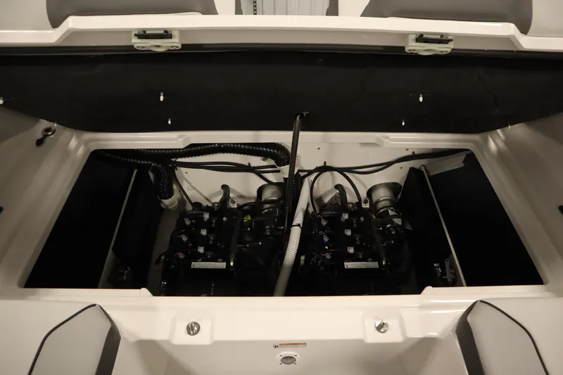 Slide: The Image of 2026 Yamaha Boats SX220 engine compartment, showcasing dual engines and wiring. - 33