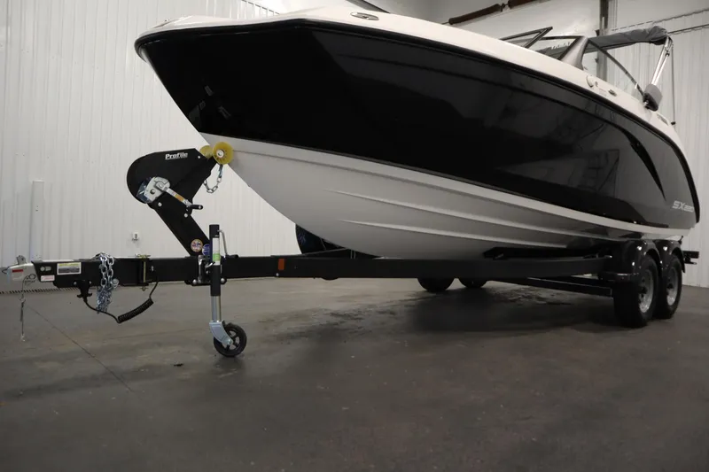 Slide: The Image of 2026 Yamaha Boats SX220 on trailer in indoor storage facility. - 40
