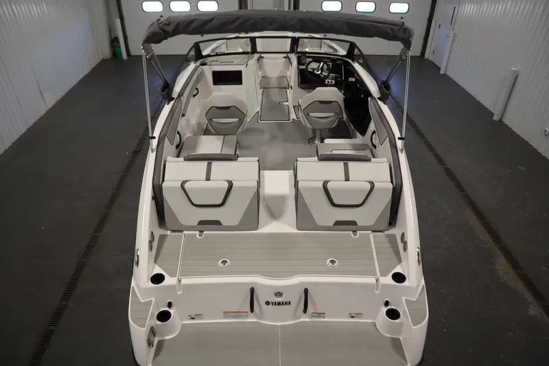 Slide: The Image of 2026 Yamaha Boats SX220 interior, featuring sleek seating and modern design in a spacious layout. - 9