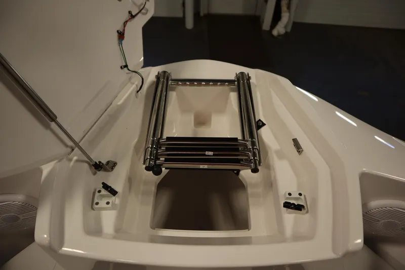 Slide: The Image of 2026 Yamaha Boats SX220 bow with sleek deck design and integrated speakers. - 12