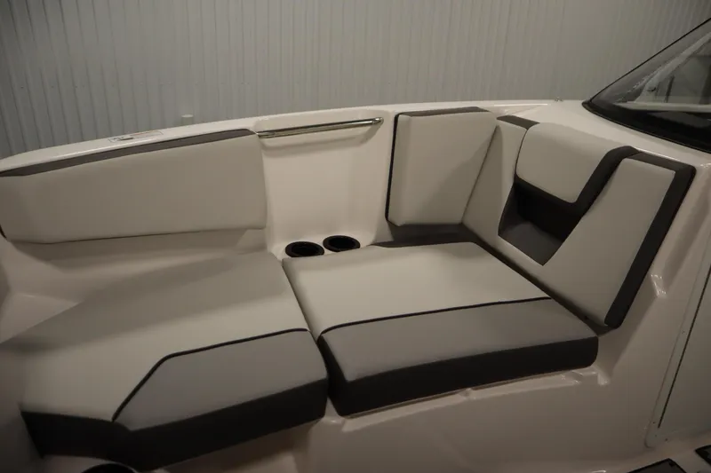 Slide: The Image of 2026 Yamaha Boats SX220 interior with seating and storage compartment. - 15