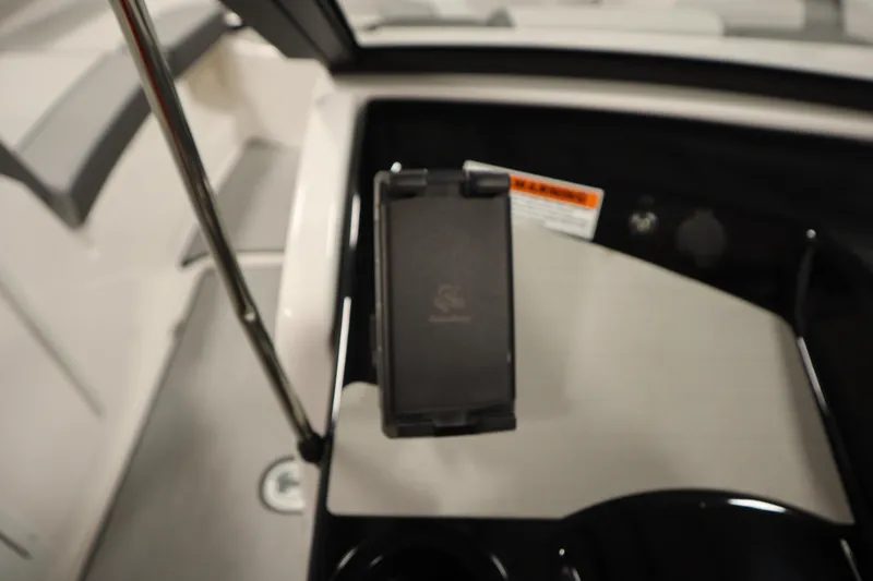 Slide: The Image of Steering wheel of 2026 Yamaha Boats SX220, featuring modern dashboard controls. - 22