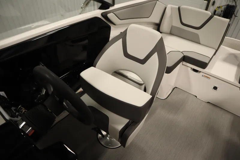 Slide: The Image of Control panel of 2026 Yamaha Boats SX220 with switches and display screen. - 27