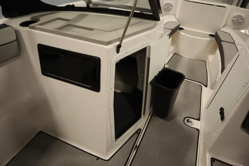 Slide: The Image of 2026 Yamaha Boats SX220 interior with modern seating and steering wheel design. - 31