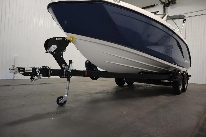 Slide: The Image of 2026 Yamaha Boats SX220 on trailer in indoor storage facility. - 44