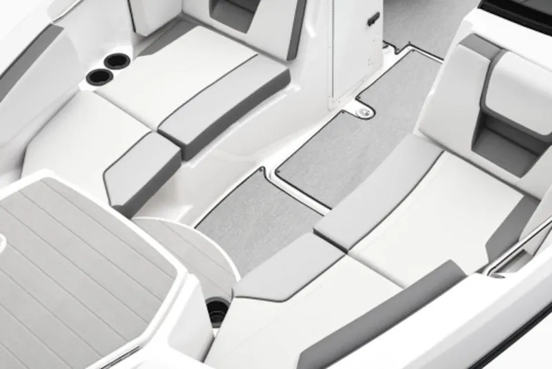 Slide: The Image of 2026 Yamaha Boats SX220 interior with sleek, modern seating and cup holders. - 49